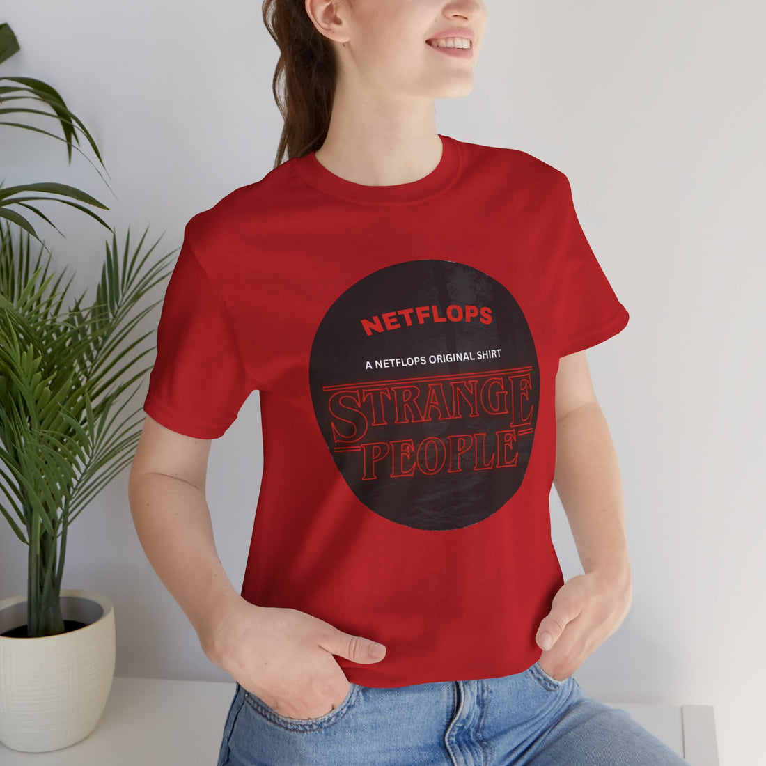 Strange People by NetFlops T-Shirt