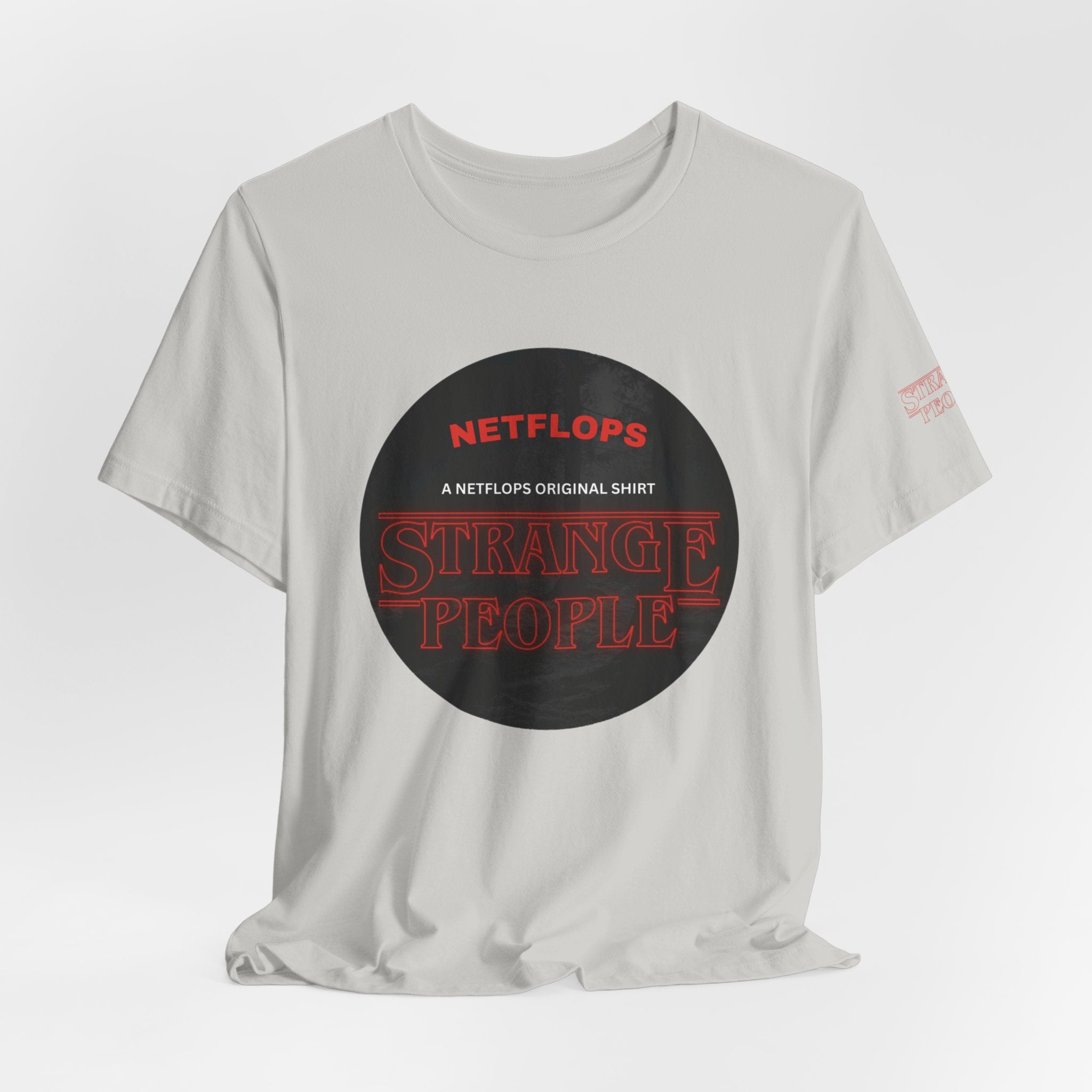 Strange People by NetFlops T-Shirt
