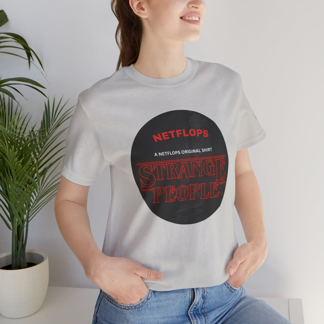 Strange People by NetFlops T-Shirt