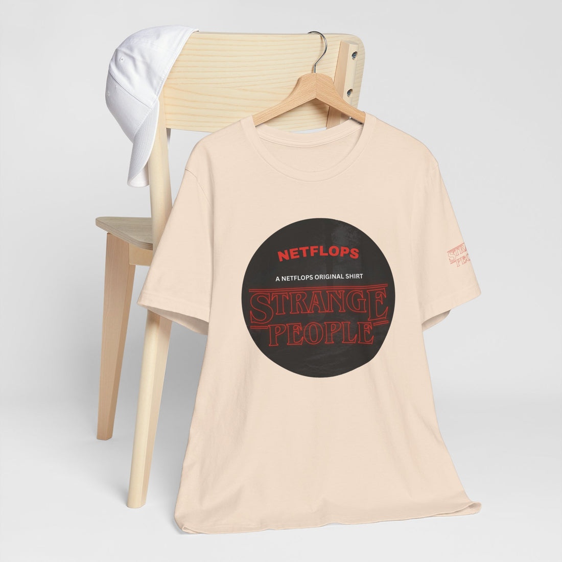 Strange People by NetFlops T-Shirt