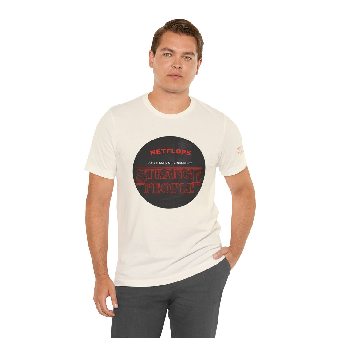 Strange People by NetFlops T-Shirt