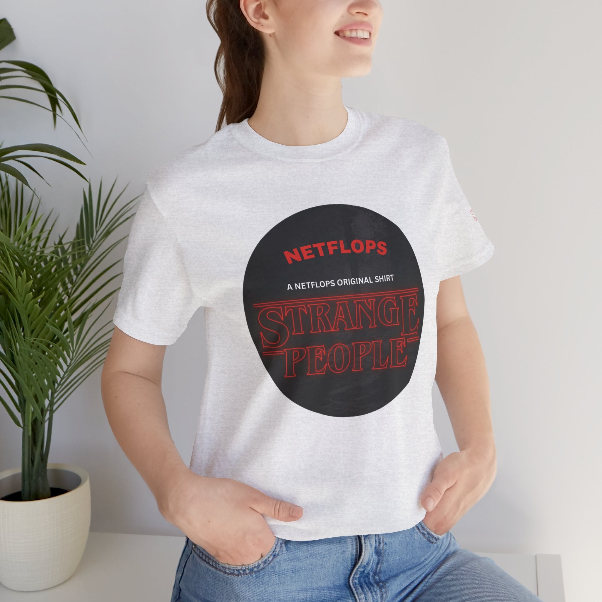 Strange People by NetFlops T-Shirt