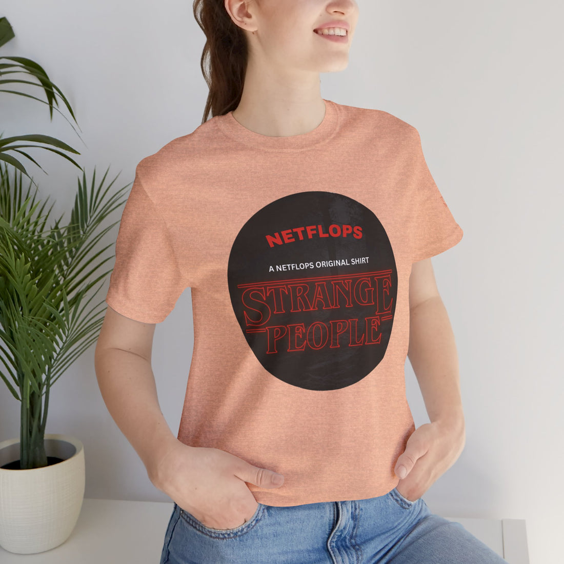 Strange People by NetFlops T-Shirt
