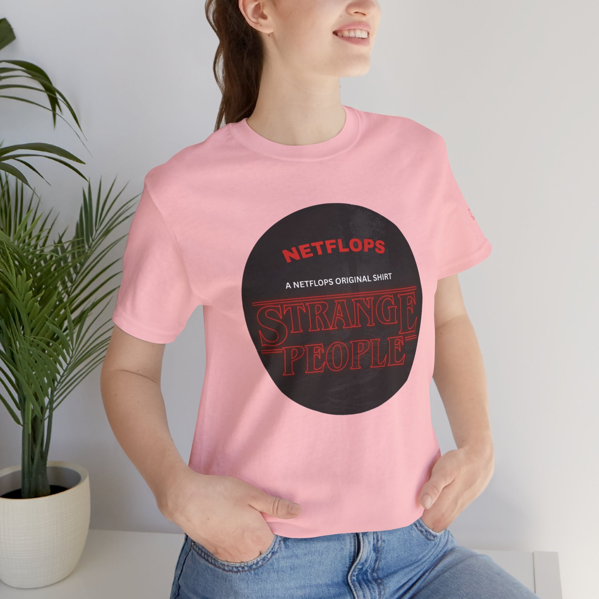 Strange People by NetFlops T-Shirt
