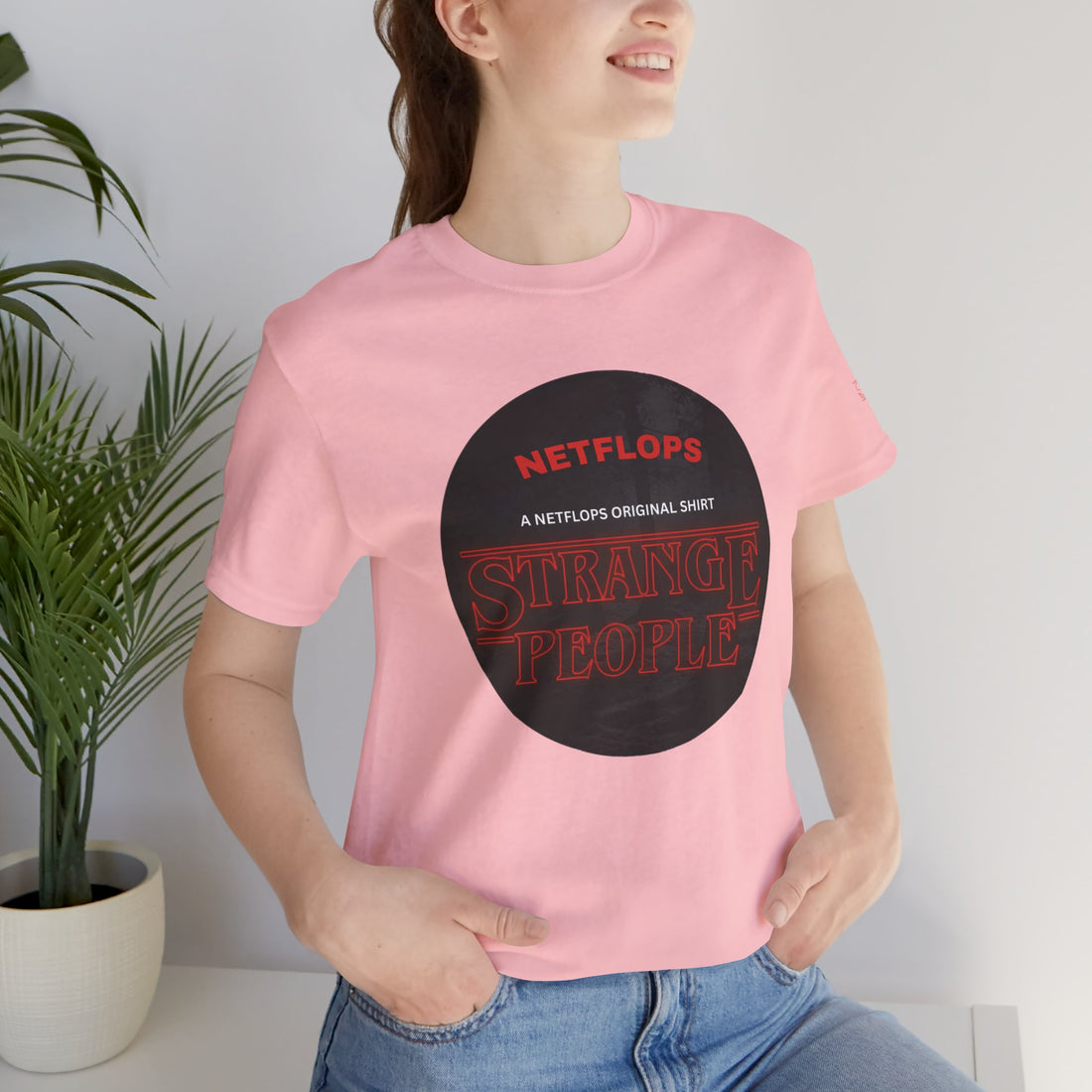 Strange People by NetFlops T-Shirt