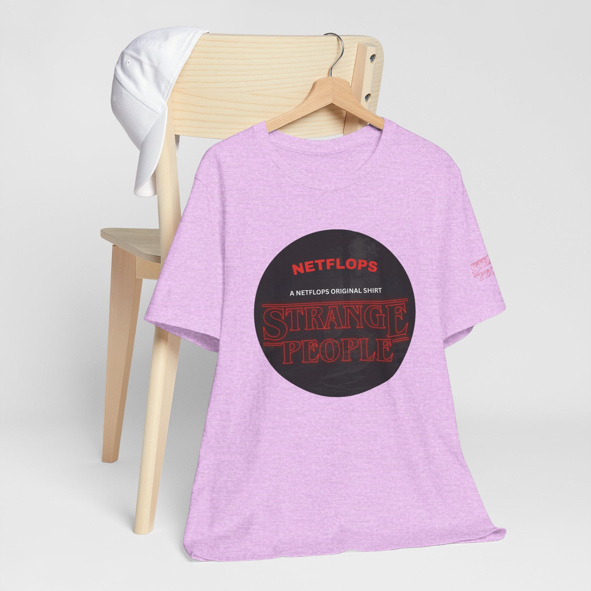 Strange People by NetFlops T-Shirt