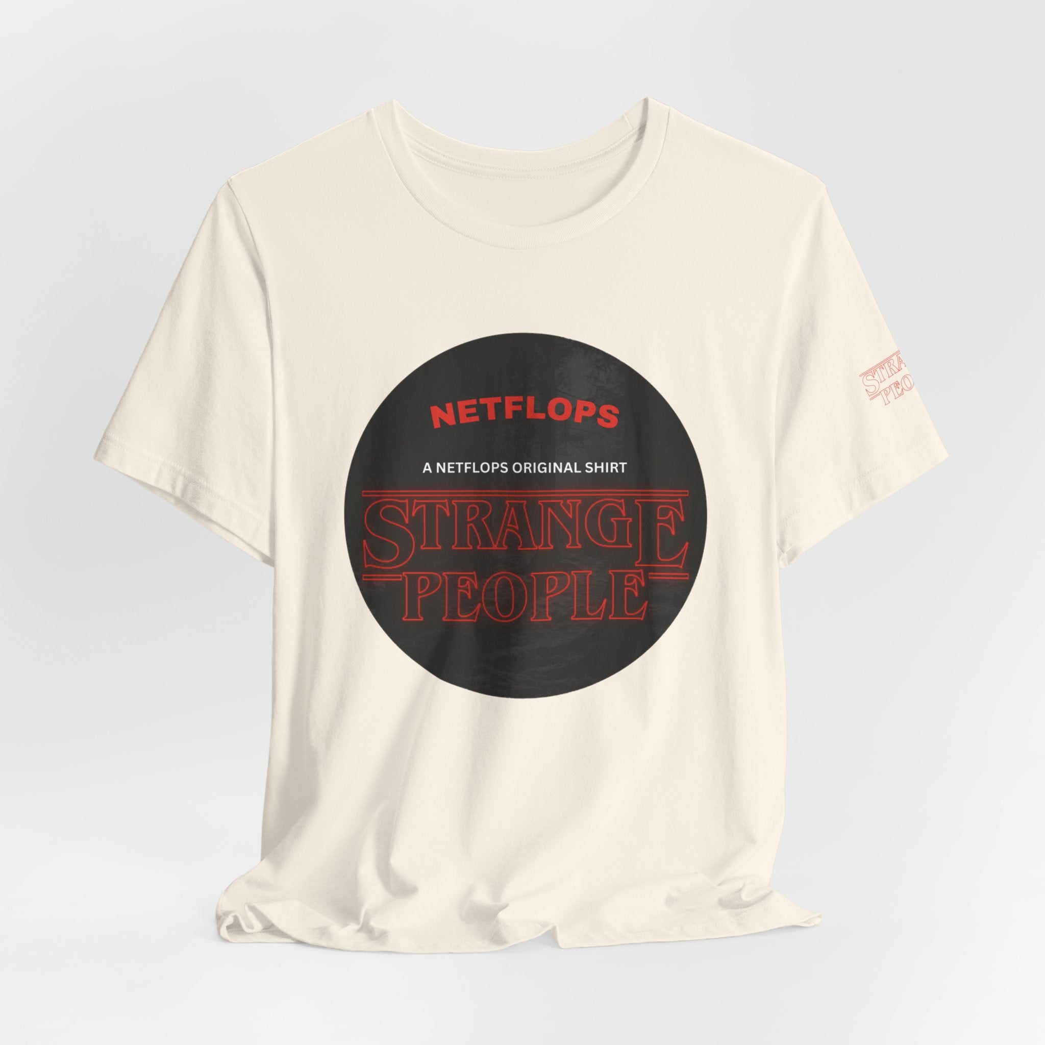 Strange People by NetFlops T-Shirt