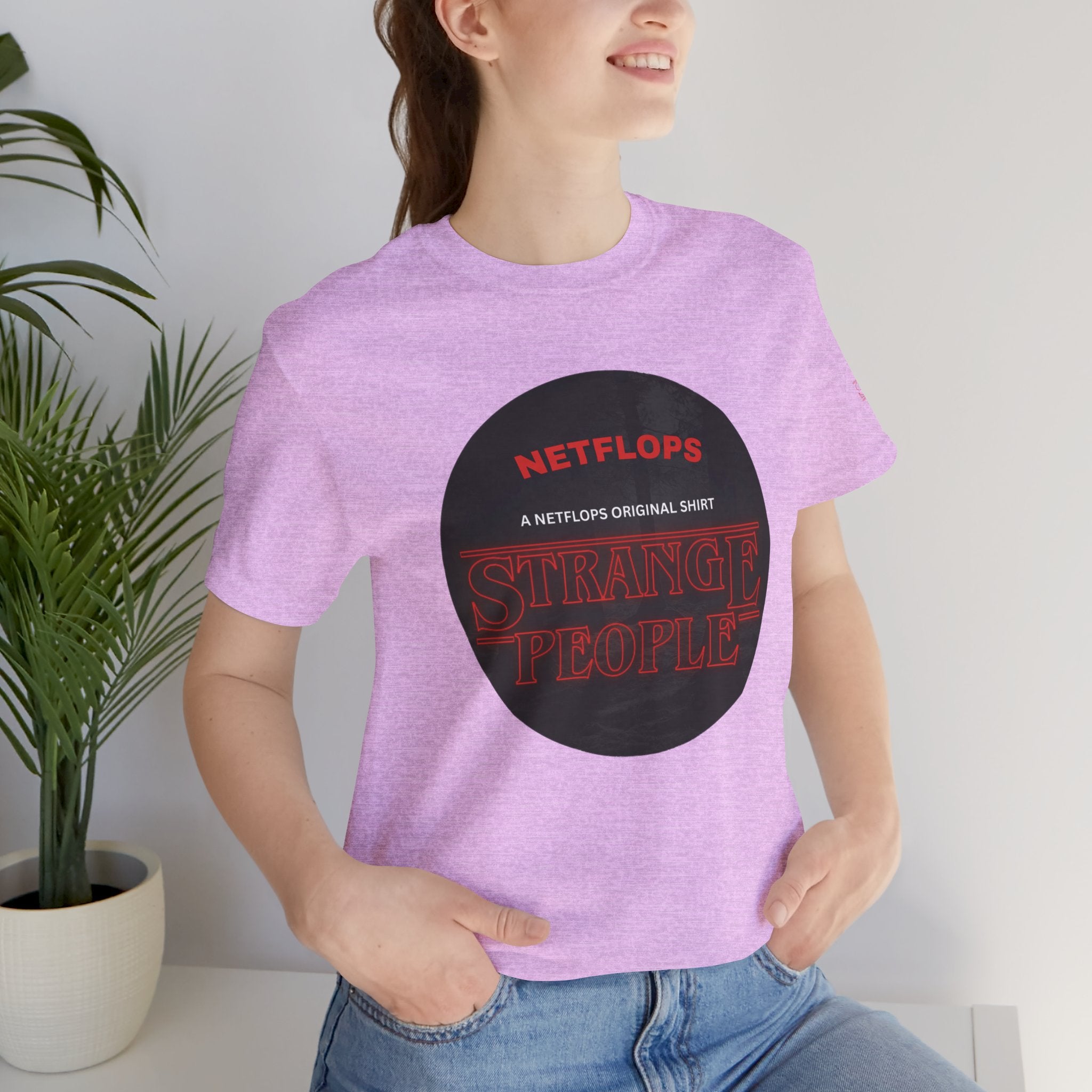 Strange People by NetFlops T-Shirt