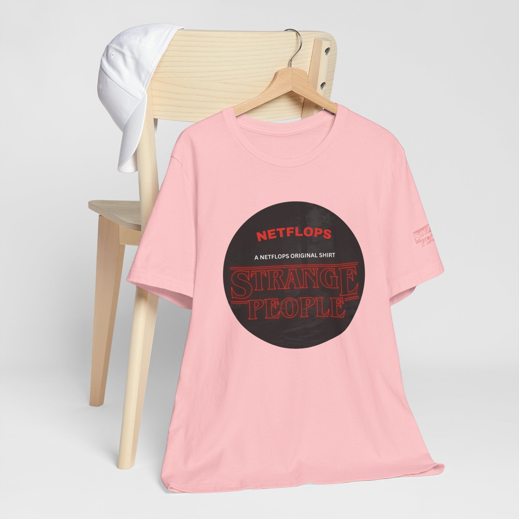 Strange People by NetFlops T-Shirt