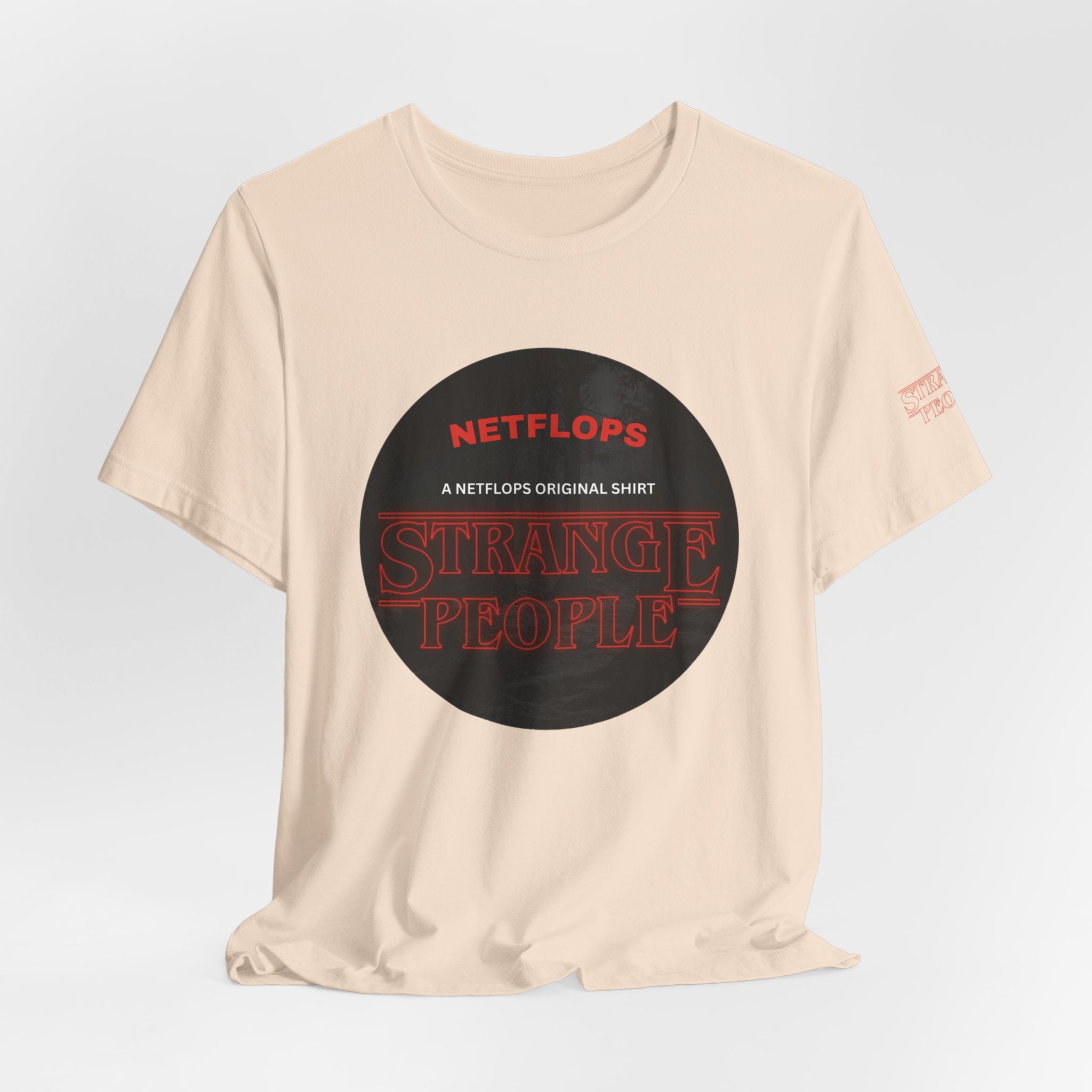 Strange People by NetFlops T-Shirt