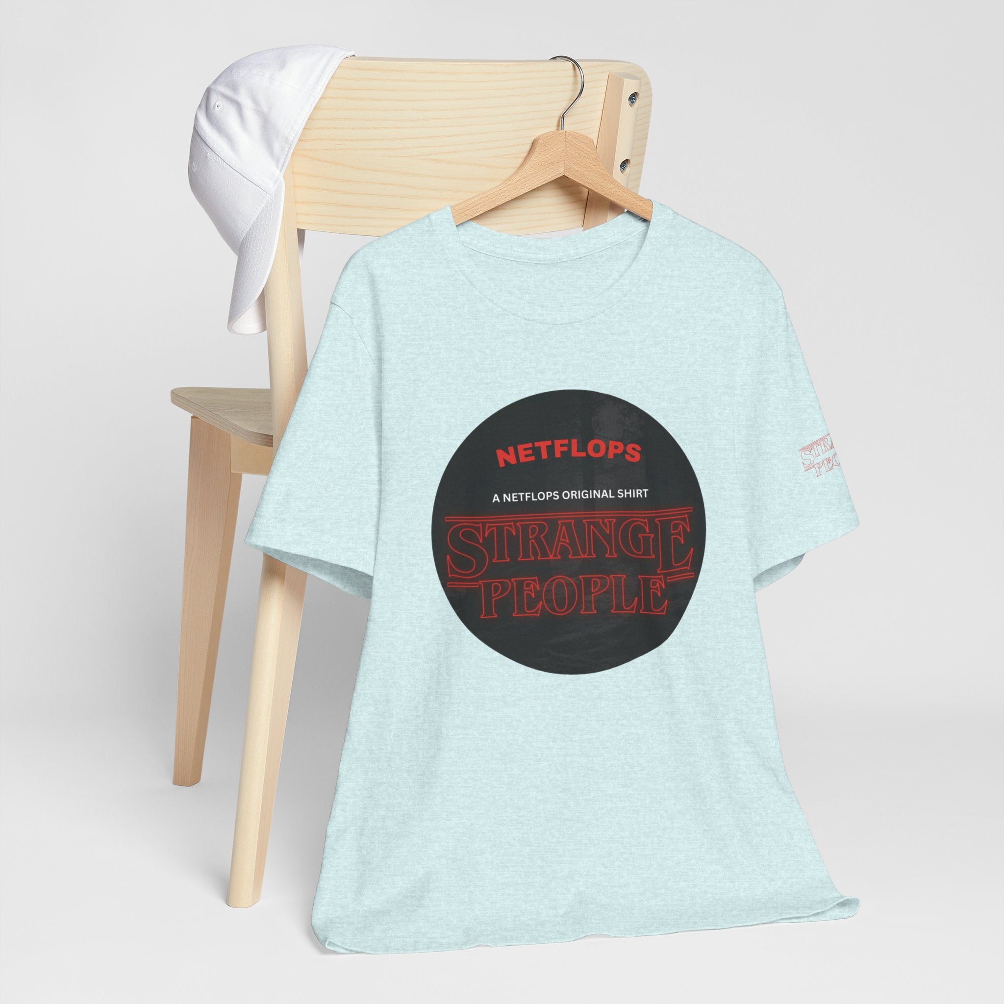 Strange People by NetFlops T-Shirt