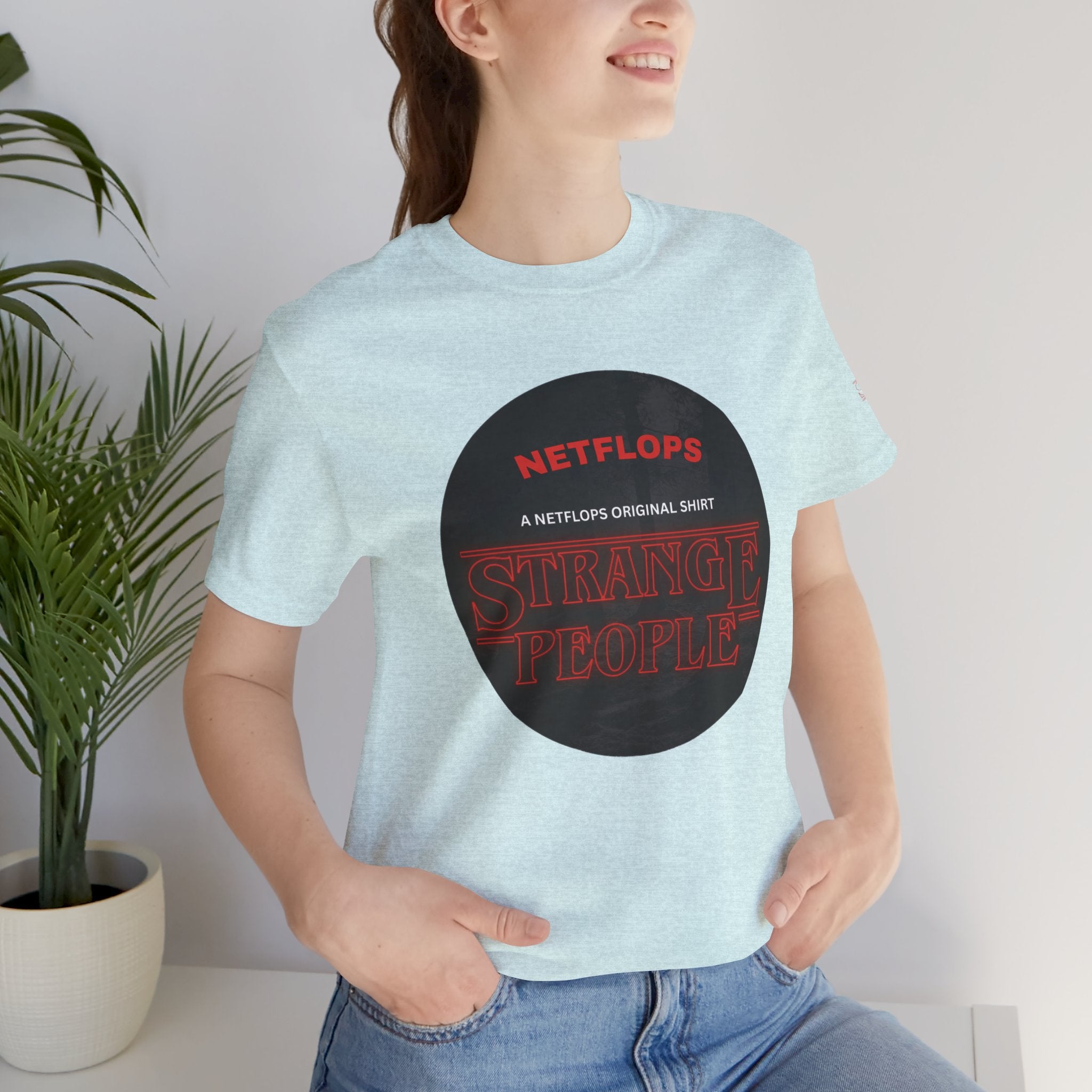 Strange People by NetFlops T-Shirt