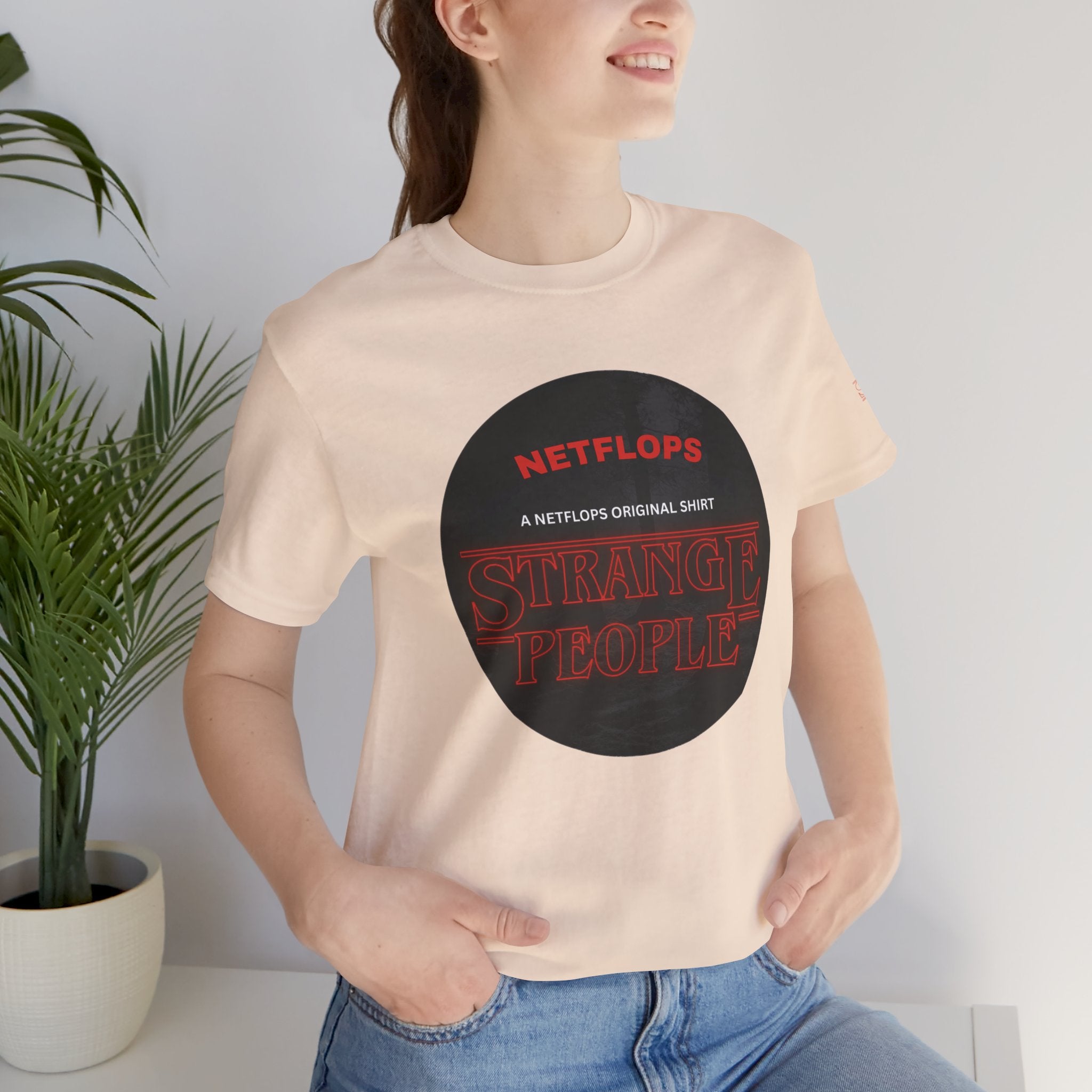 Strange People by NetFlops T-Shirt