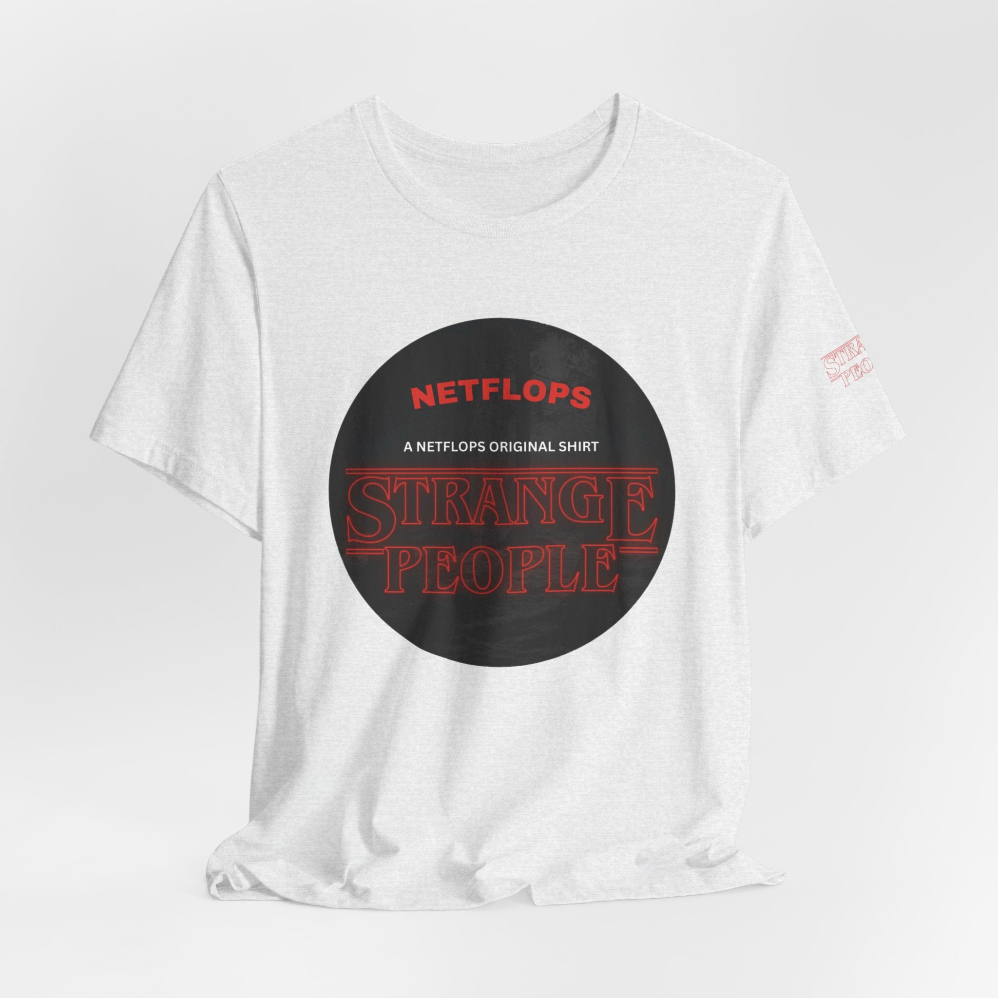 Strange People by NetFlops T-Shirt
